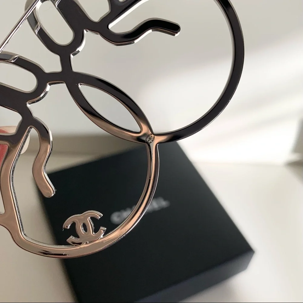 Chanel large peace hands pin